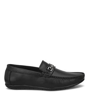 low-top loafers with metal accent