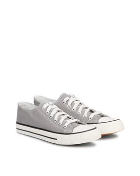 low-top lace-up shoes