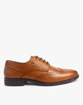 low-top lace-up wing-tip derby shoes