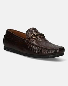 low-top loafers with metal accent