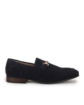 low-top loafers with metal accent