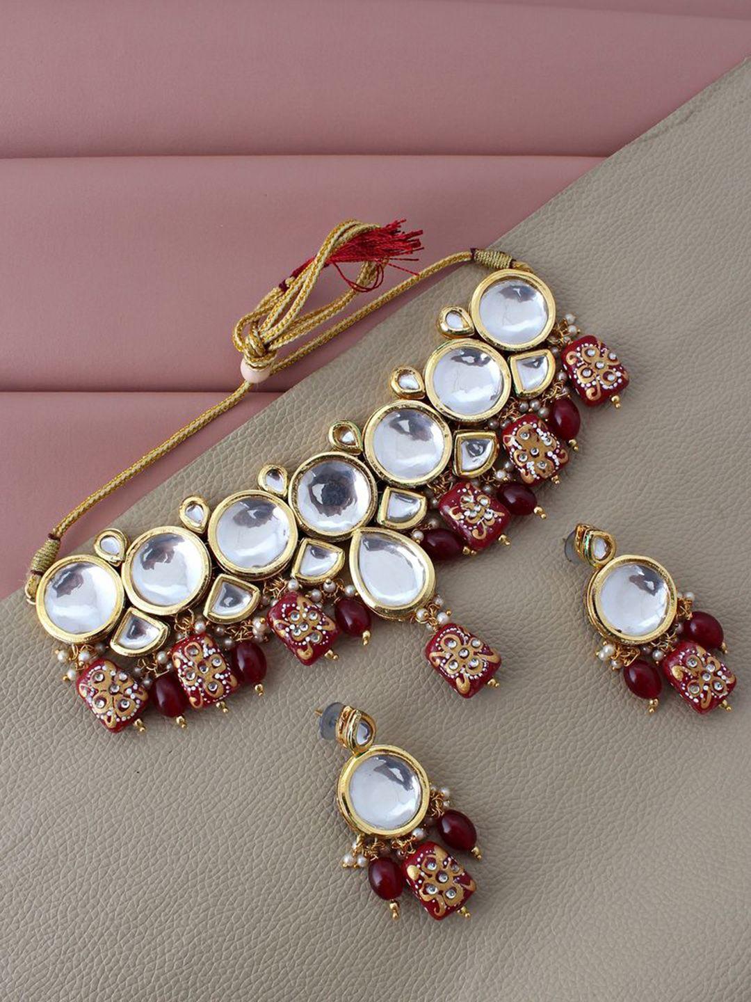 lucky jewellery gold-plated white & maroon kundan-studded & beaded jewellery set