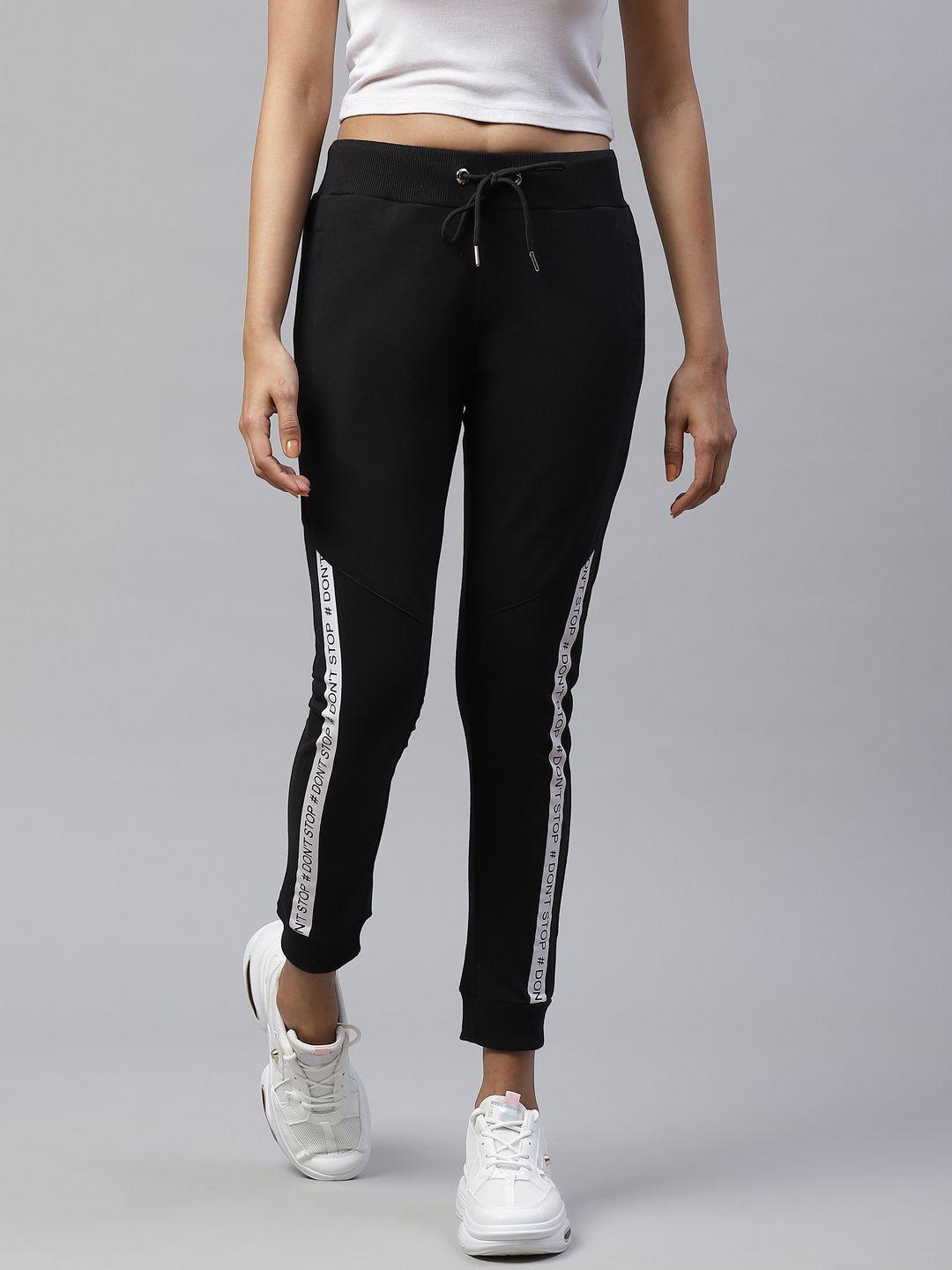 m7 by metronaut women black slim fit solid joggers with printed detail