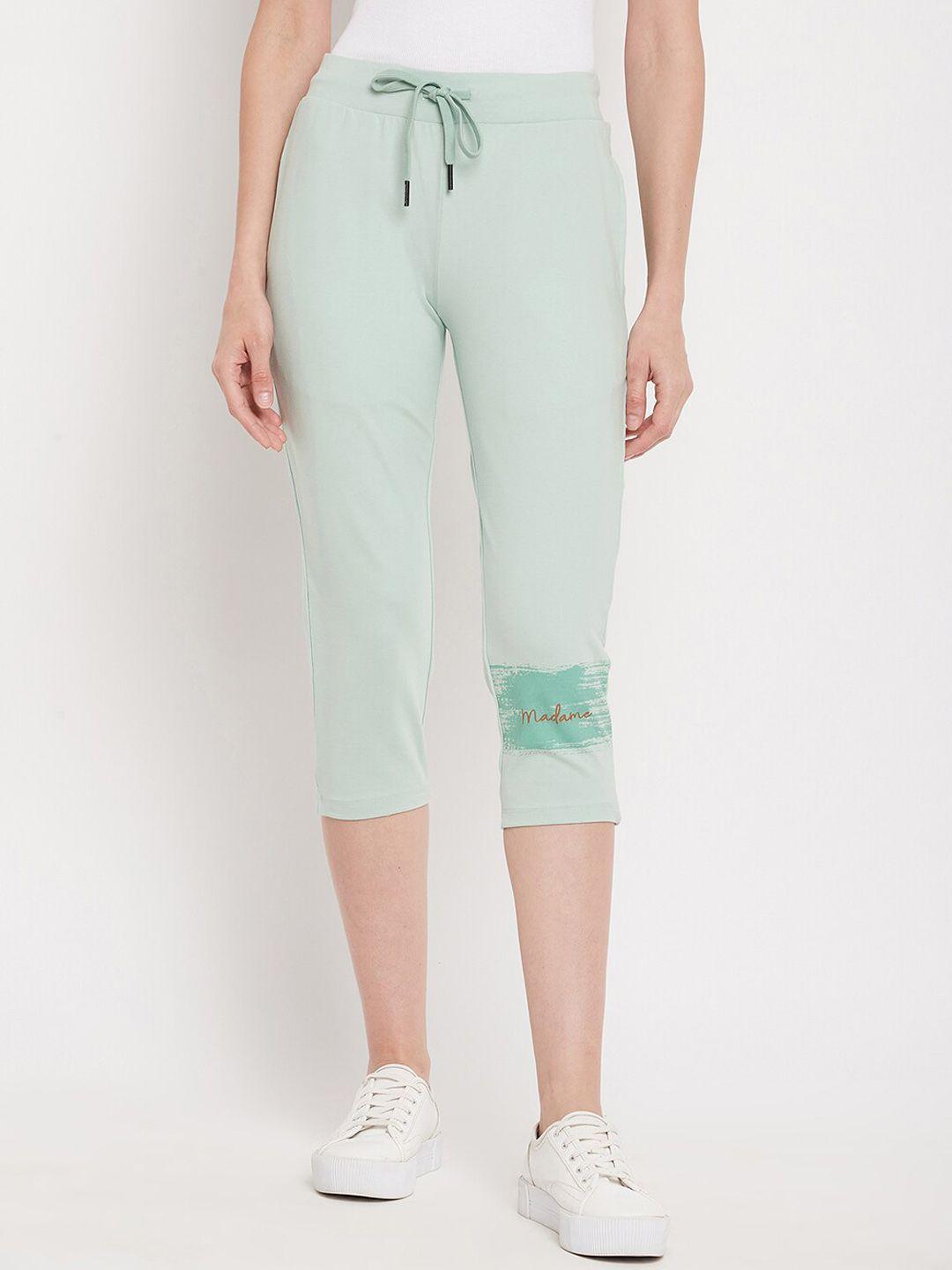 madame women green solid three-fourth length track pants