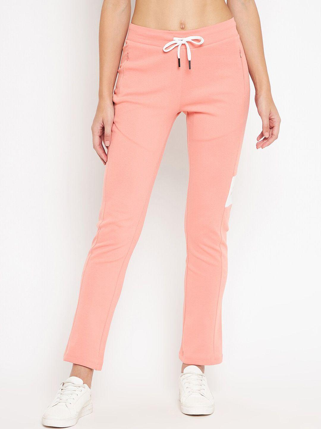 madame women peach-coloured solid track pants