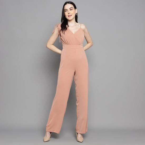 madame women solid asymmetric neck jumpsuit