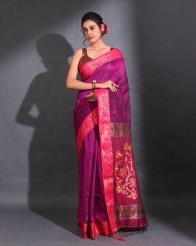 magenta cotton blend handwoven saree with floral motifs and lotus designs saree