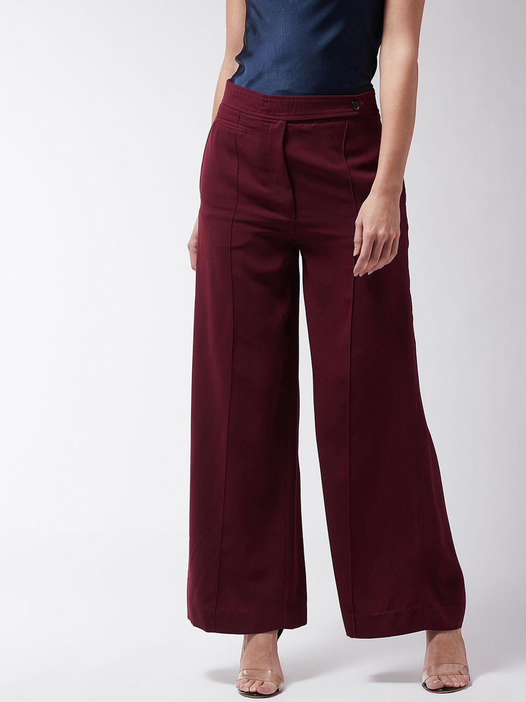magre women maroon flared solid parallel trousers
