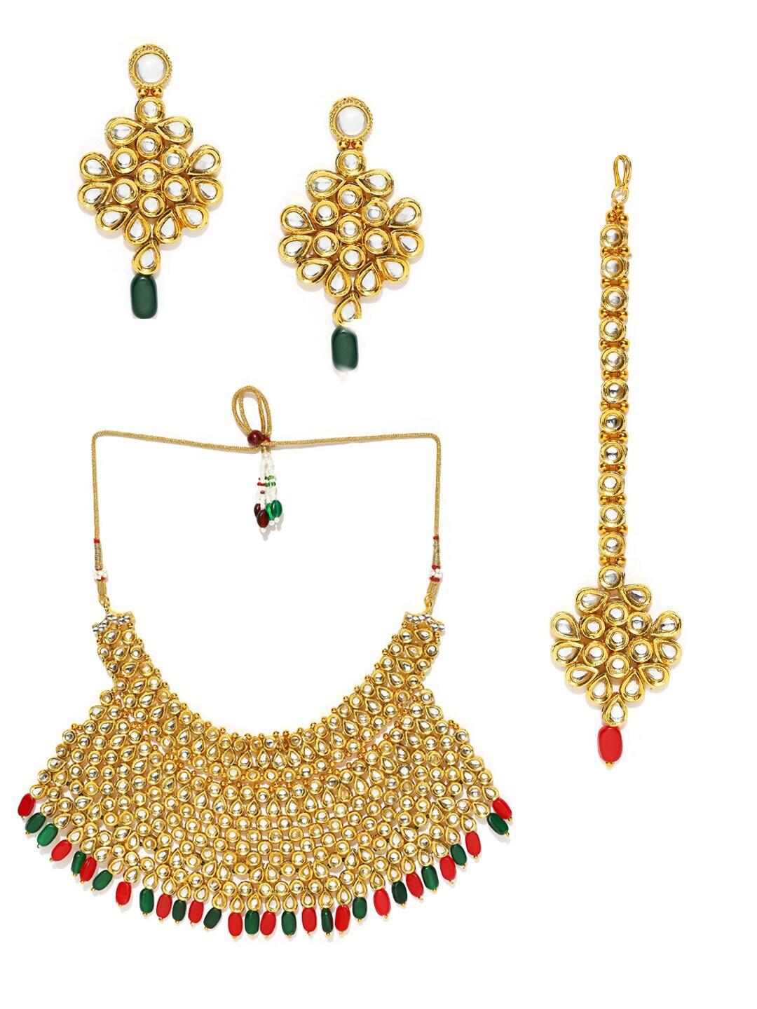 manath gold-plated stone-studded jewellery set
