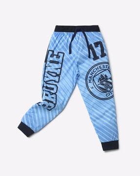 manchester city print cuffed track pants