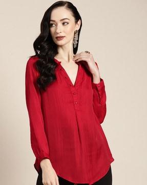 mandarin-collar top with curved hem