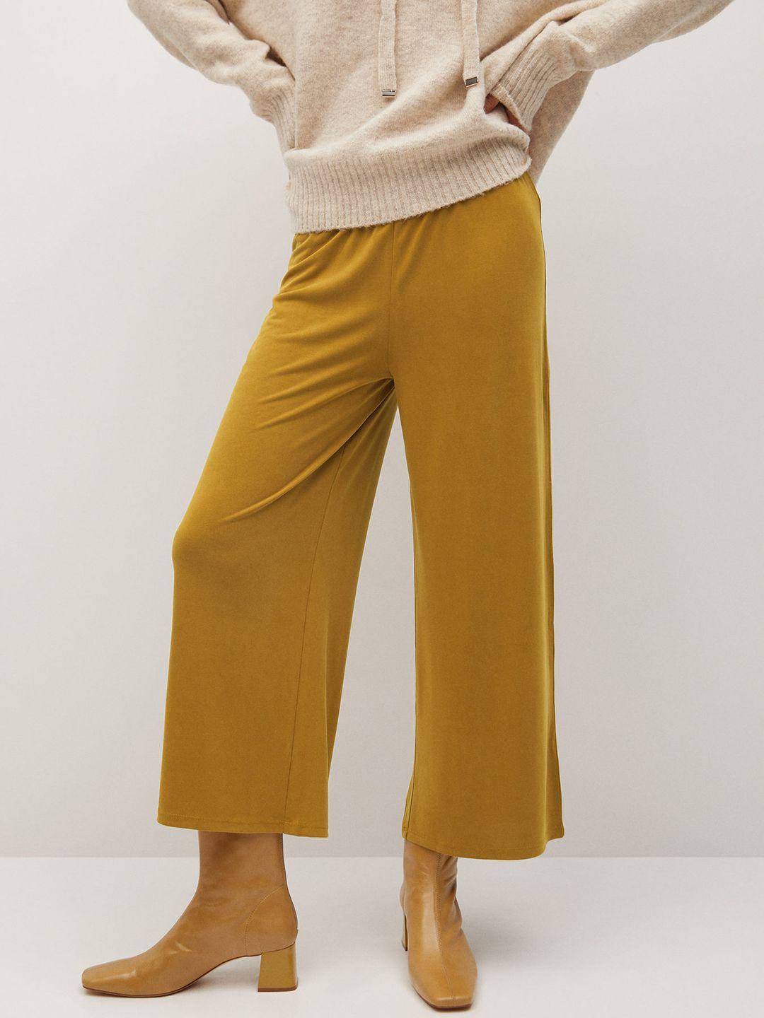 mango women mustard yellow solid cropped parallel trousers