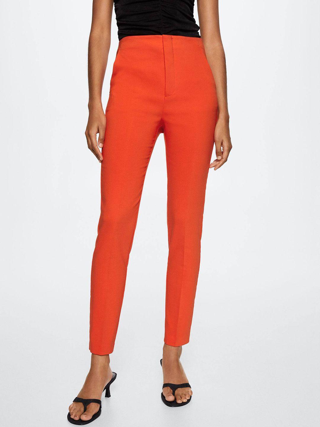 mango women orange solid trousers