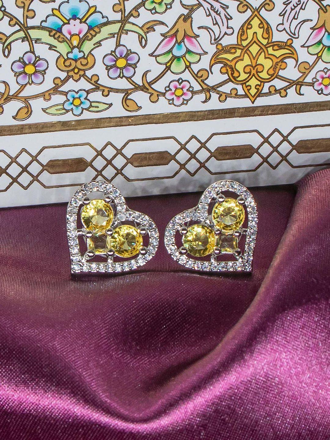 manikya rhodium-plated cubic zirconia studded heart shaped studs earrings