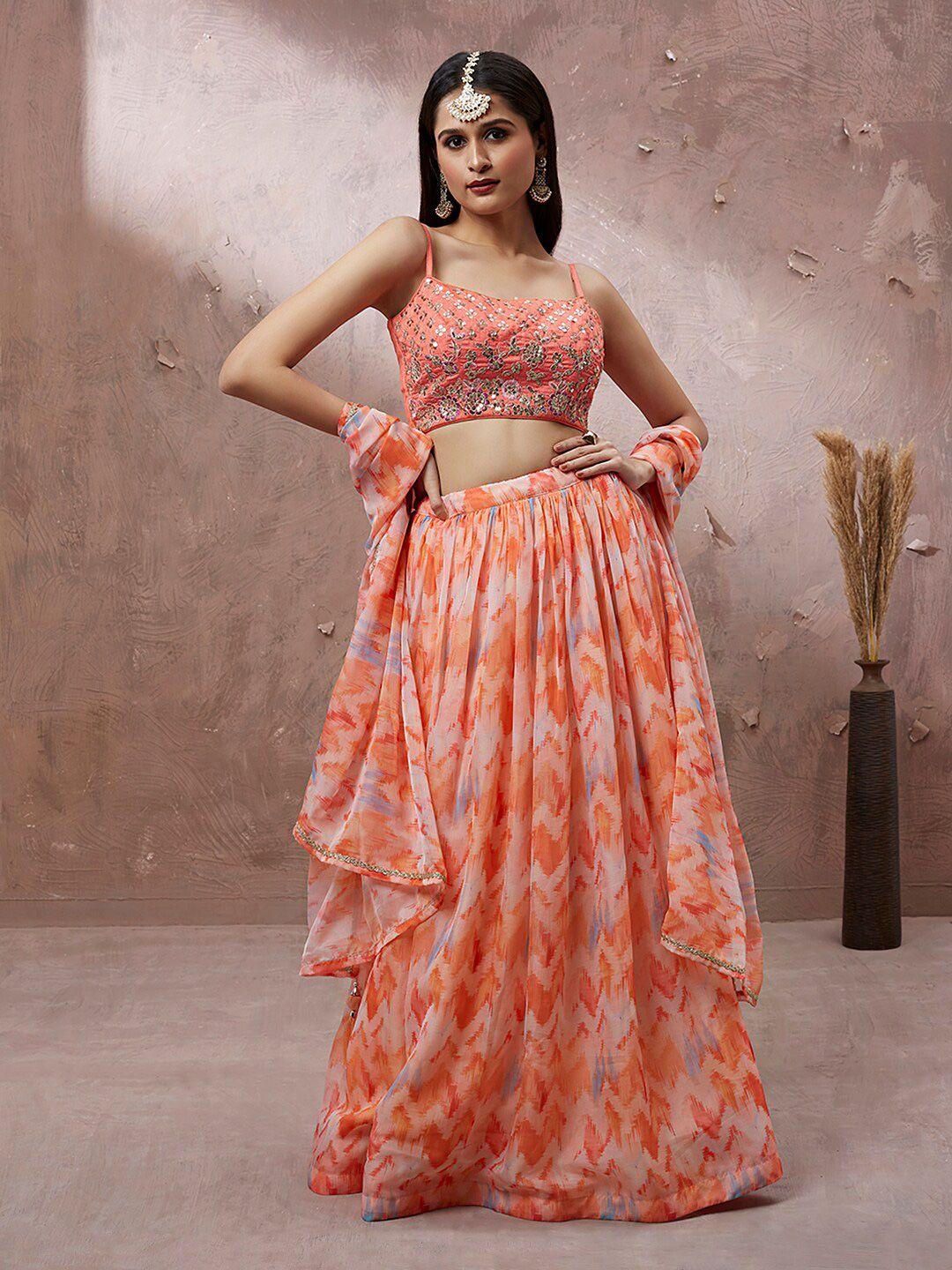 manohari peach-coloured & embroidered semi-stitched lehenga & unstitched blouse with dupatta