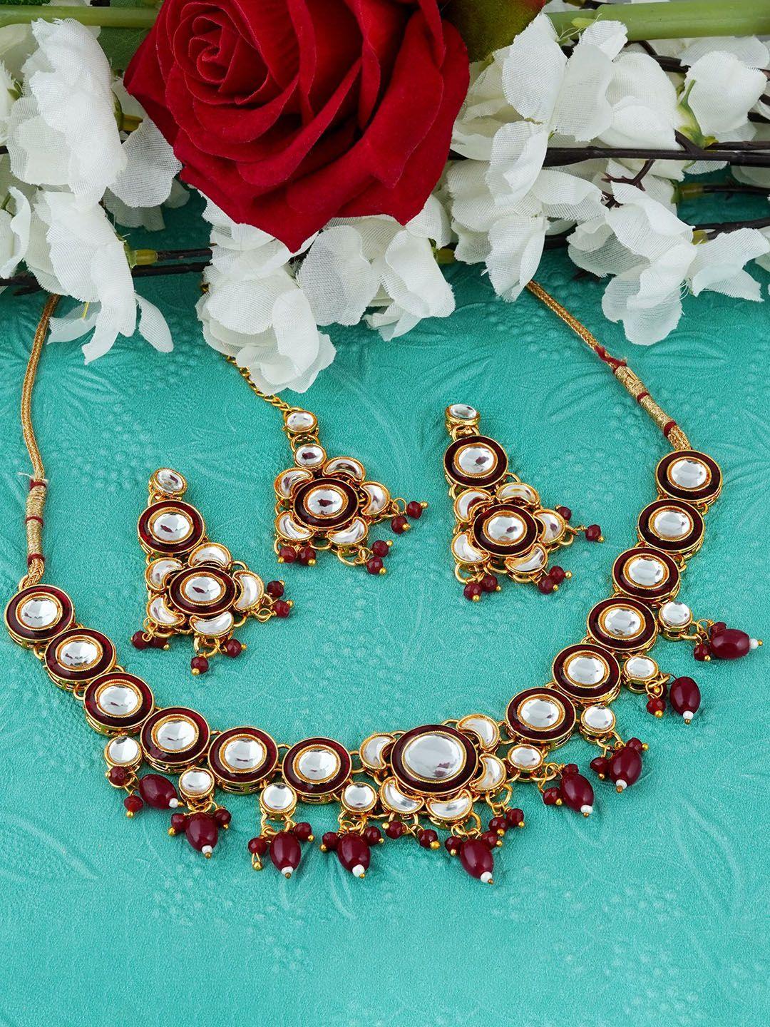 mansiyaorange gold-plated kundan-studded & beaded jewellery set with maang tikka