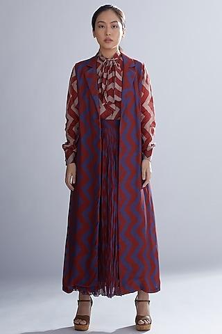 maroon cape with zig zag pattern