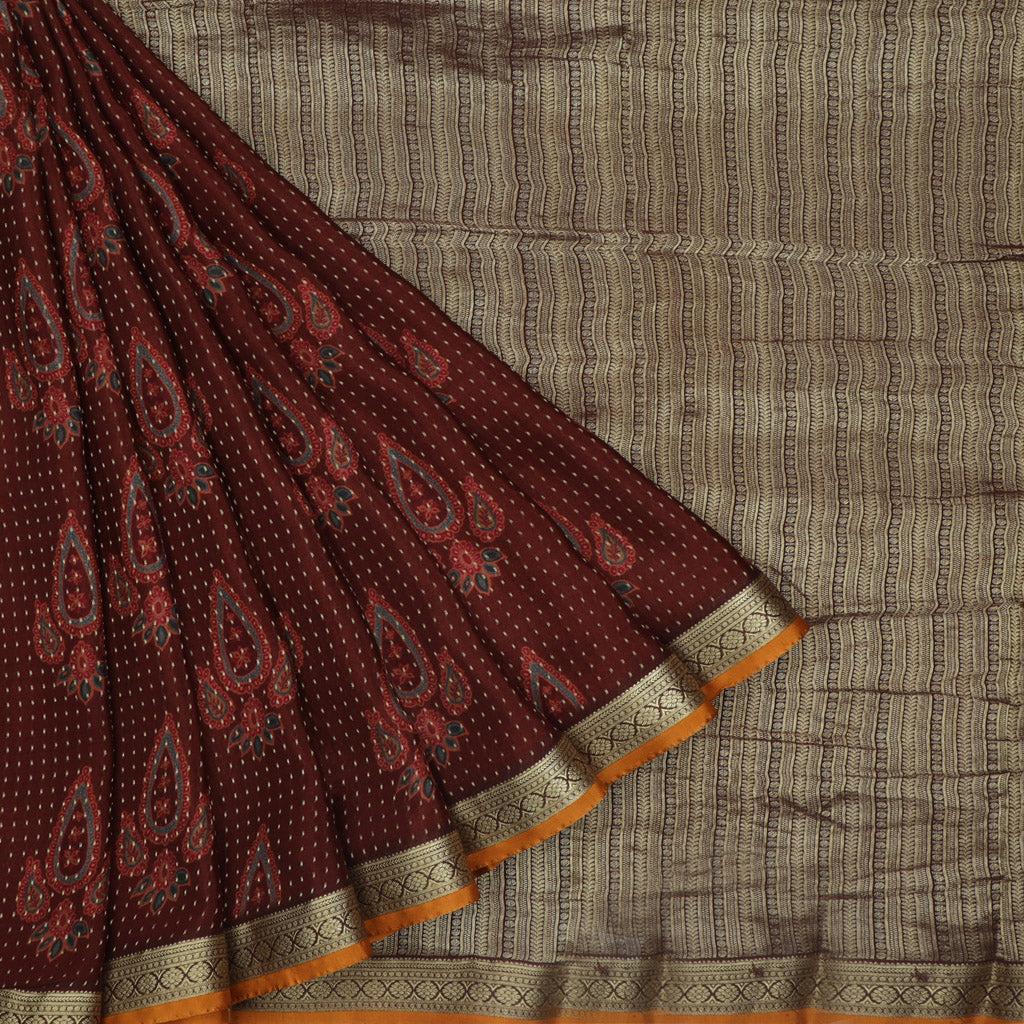 maroon color silk saree with printed floral buttas