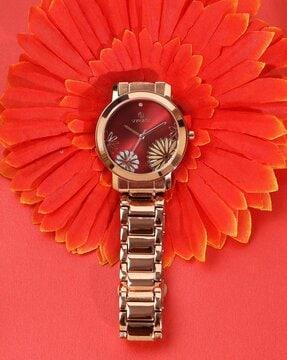 maroon dial analogue fashion watch with steel strap for women