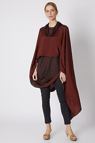 maroon draped top with black pants