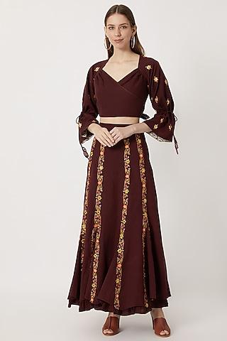 maroon wrap top with embroidered skirt