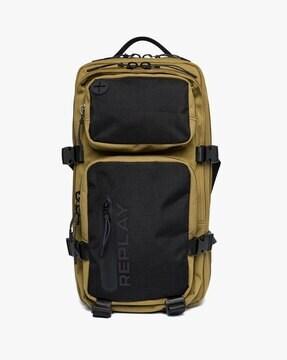 matt backpack with external zip pockets