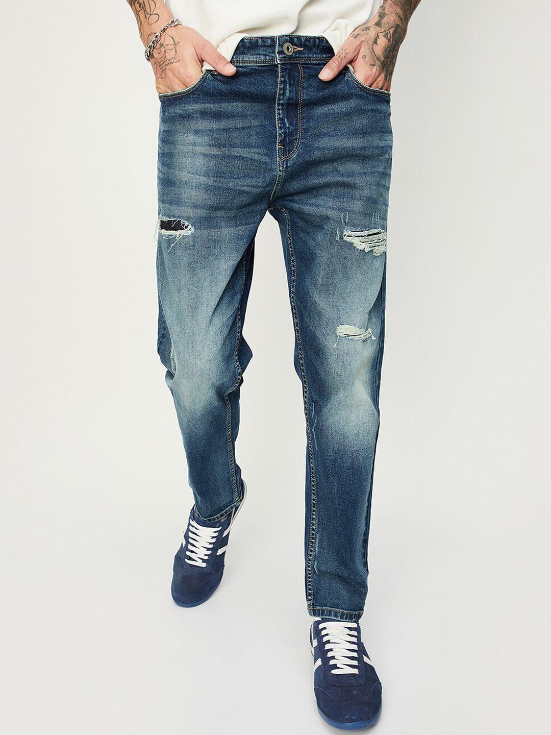 max men blue mildly distressed ripped heavy fade stretchable jeans