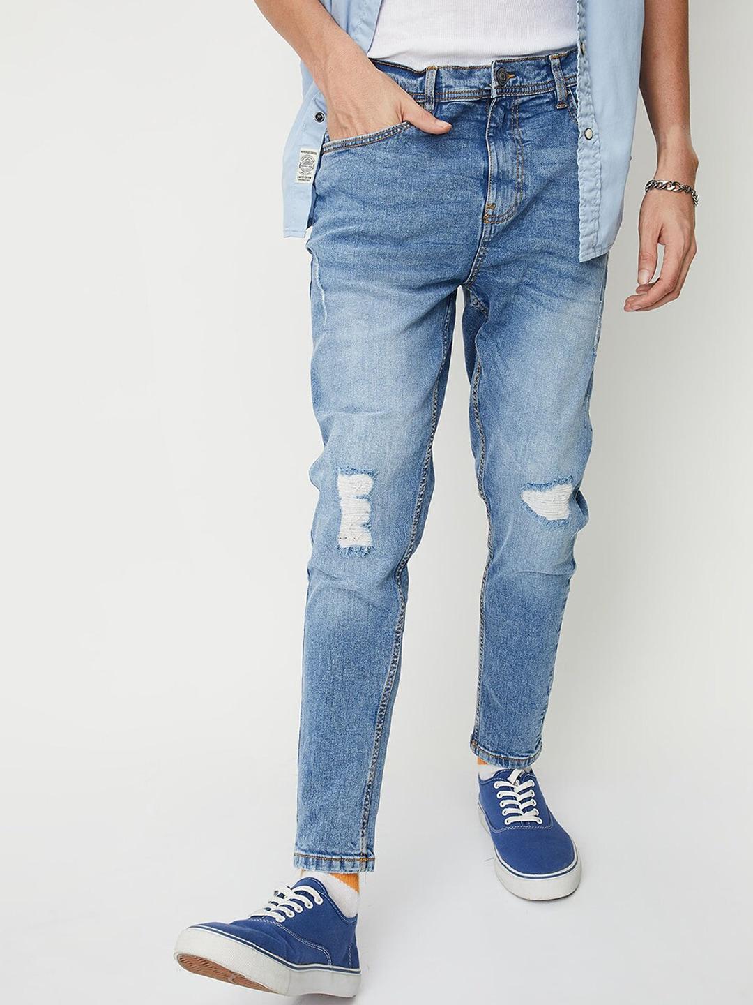 max men mildly distressed heavy fade whiskers jeans