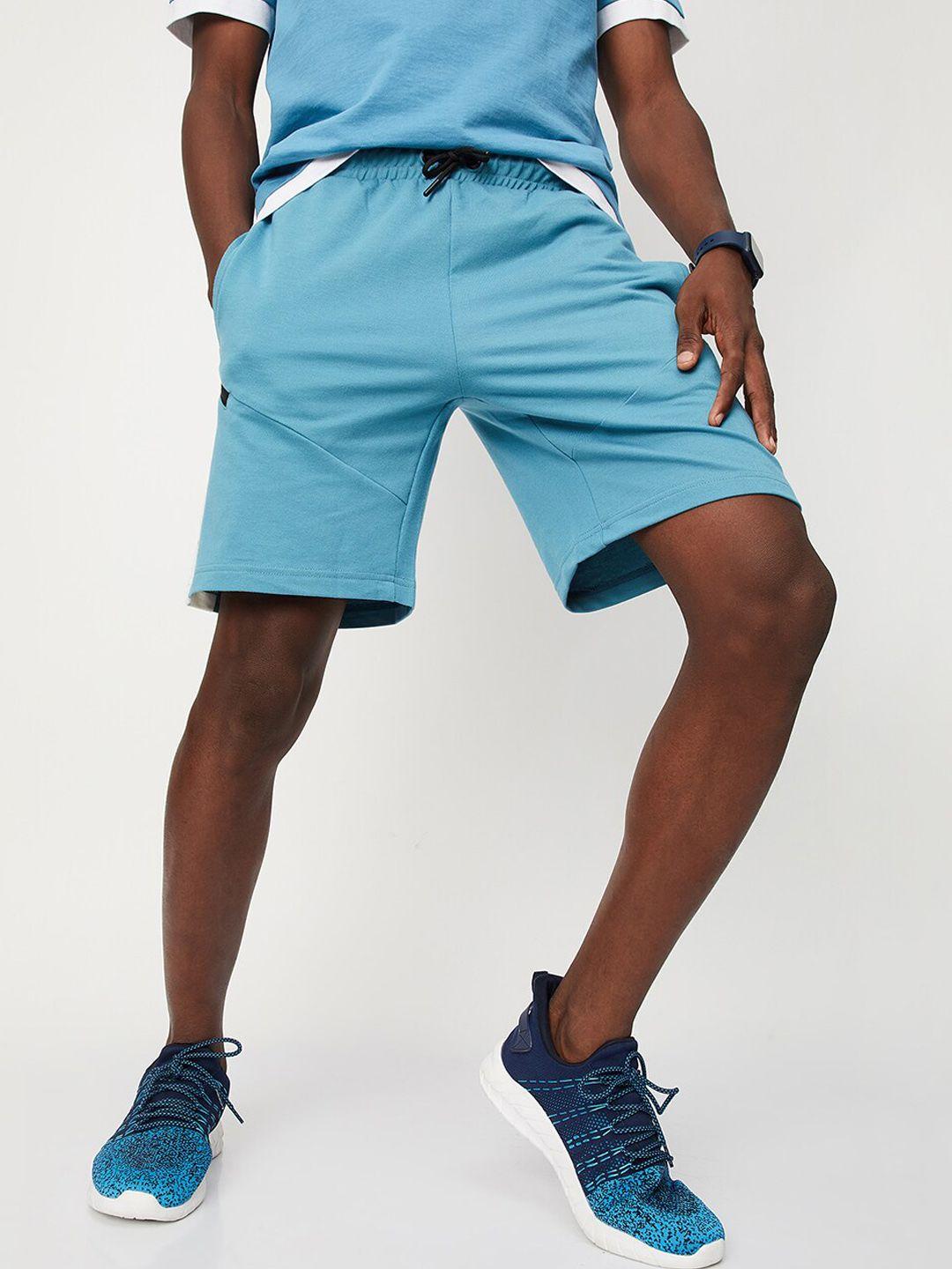 max men regular fit mid-rise sports shorts