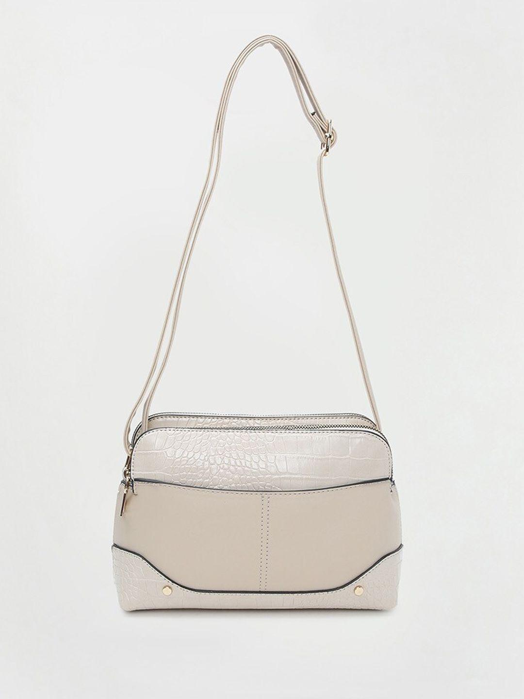 max animal textured structured sling bag