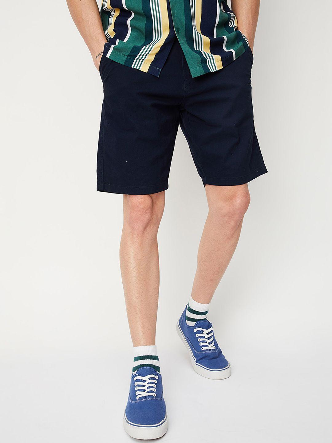 max men solid mid rise regular shorts