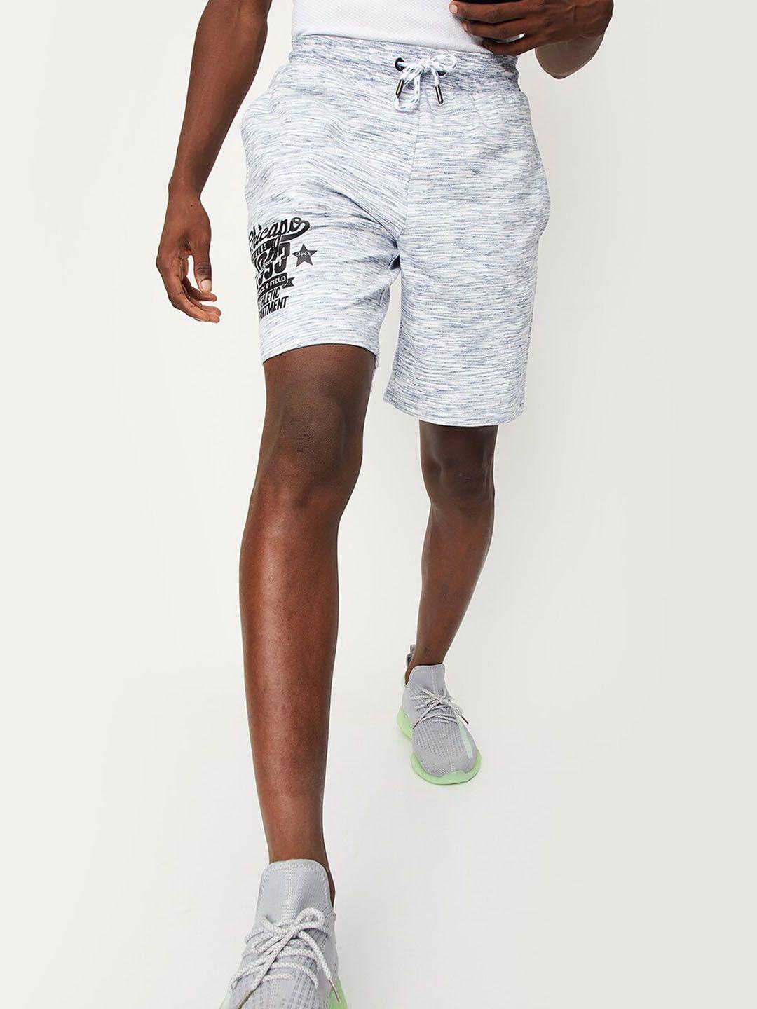 max men typography printed mid rise shorts