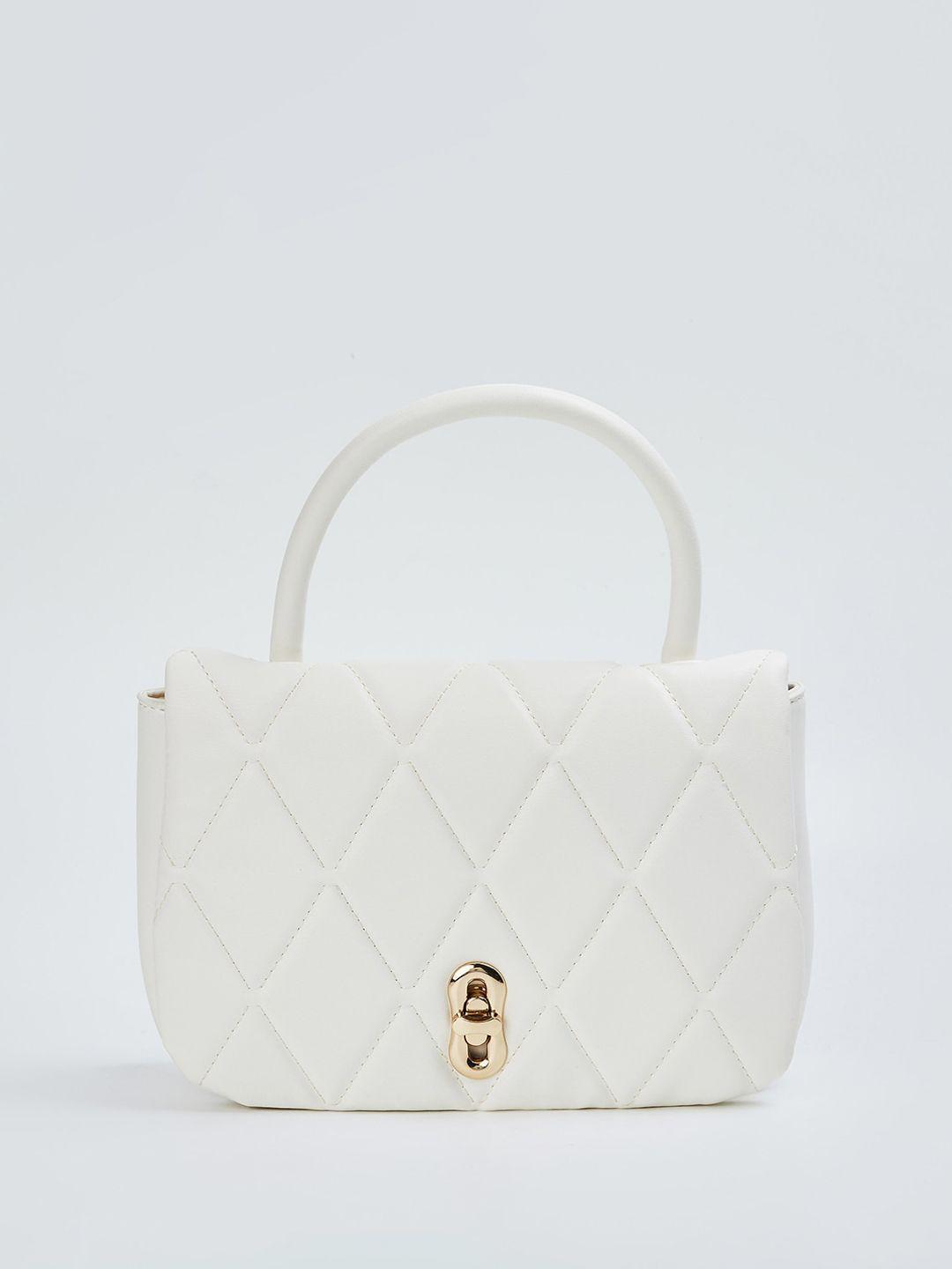 max structured sling bag with quilted detail
