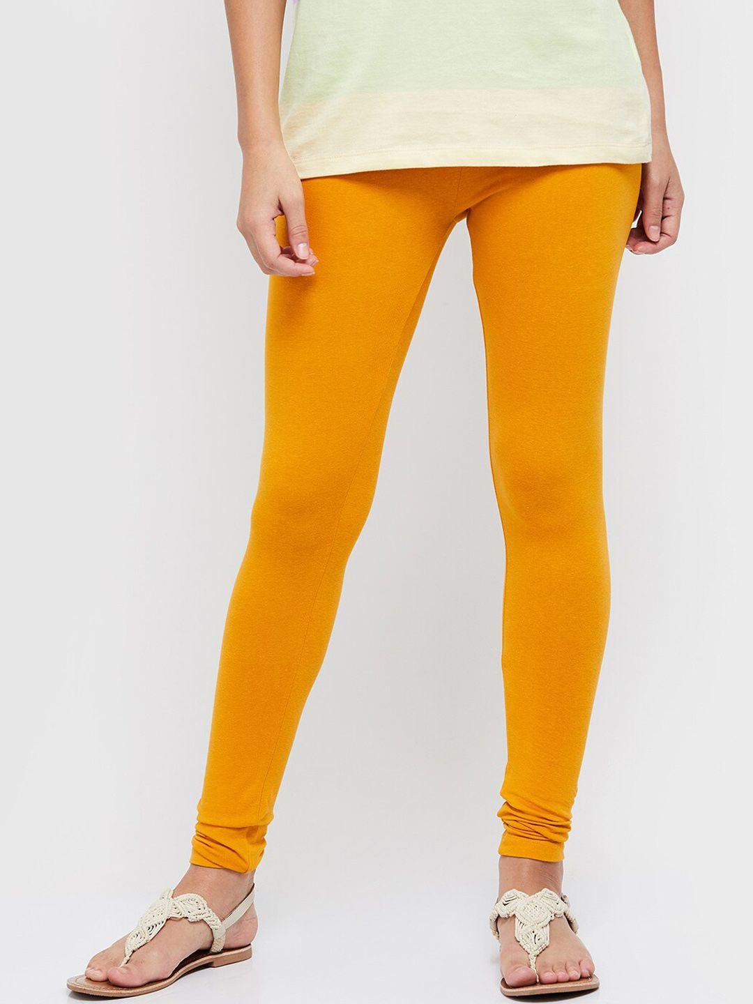 max women orange solid churidar length leggings