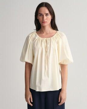 medium-length round-neck top