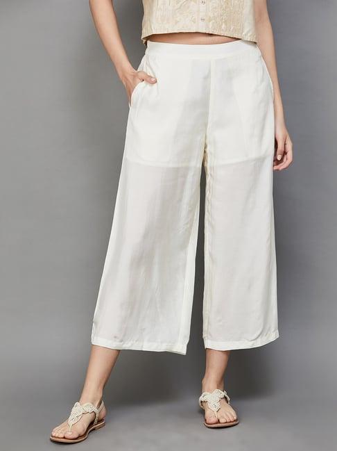 melange by lifestyle off-white mid rise flared pants
