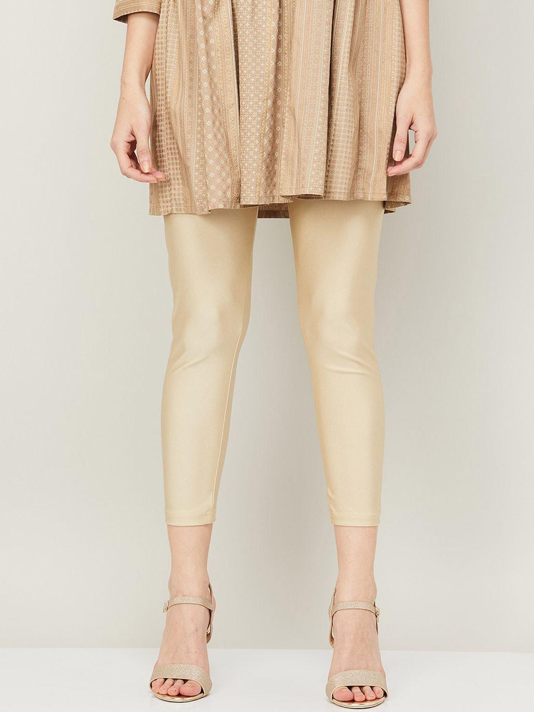 melange by lifestyle women gold-coloured solid ankle length leggings