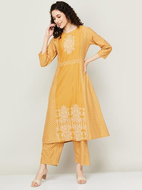melange by lifestyle mustard embroidered kurta pant set