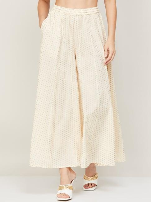 melange by lifestyle off-white cotton printed palazzos
