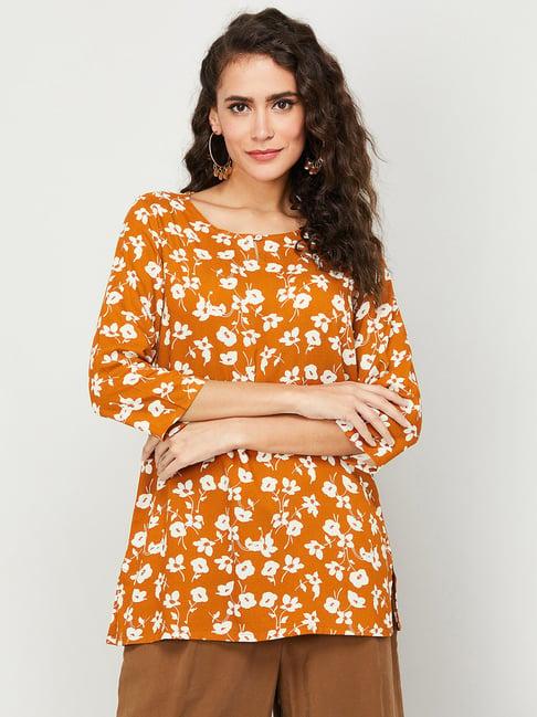 melange by lifestyle orange & white rayon floral print kurti