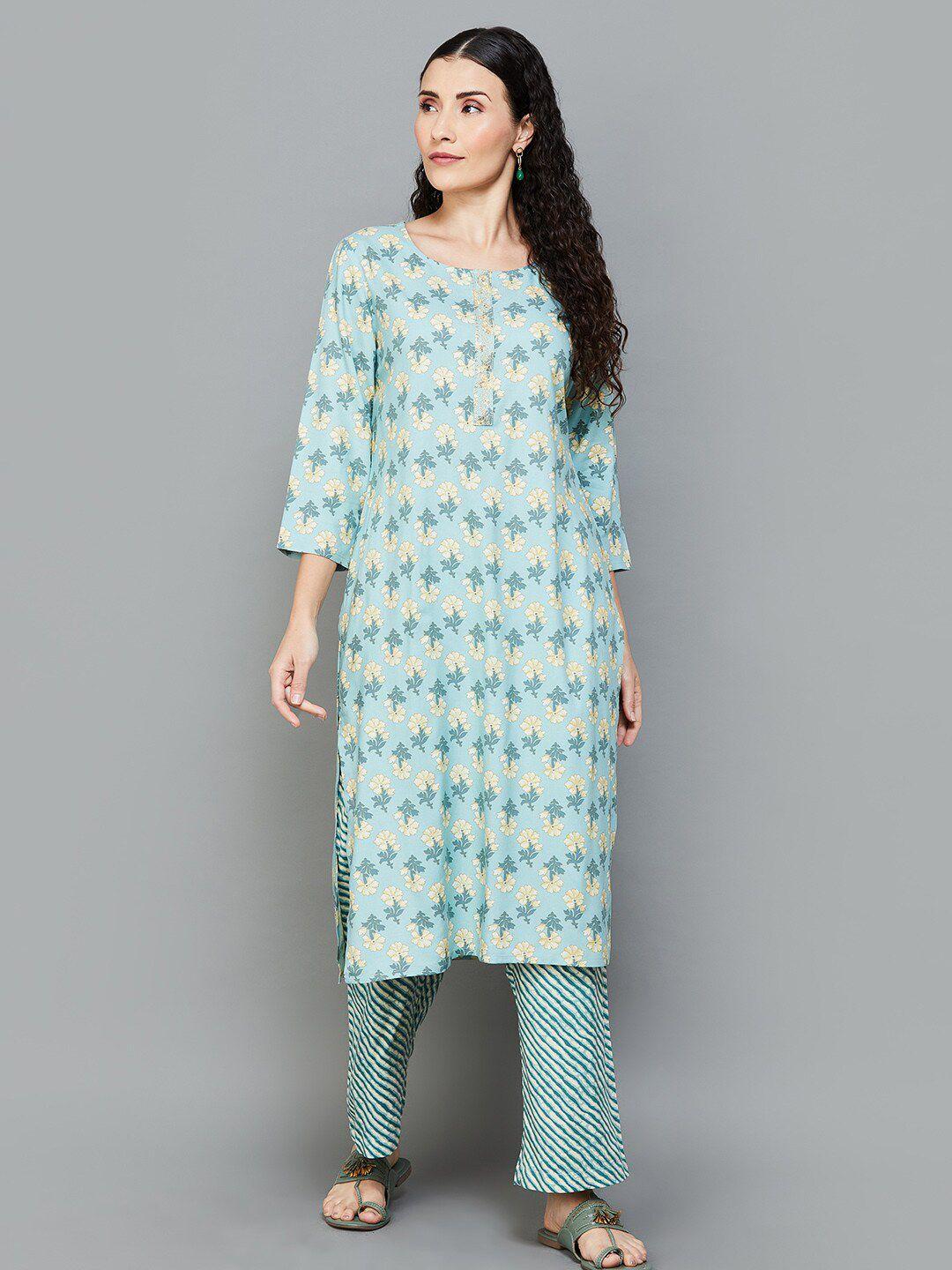 melange by lifestyle women blue floral printed regular kurta with trousers