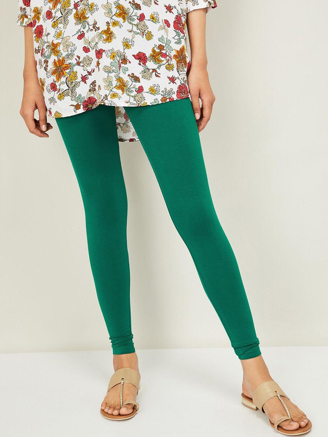 melange by lifestyle women green solid ankle-length leggings