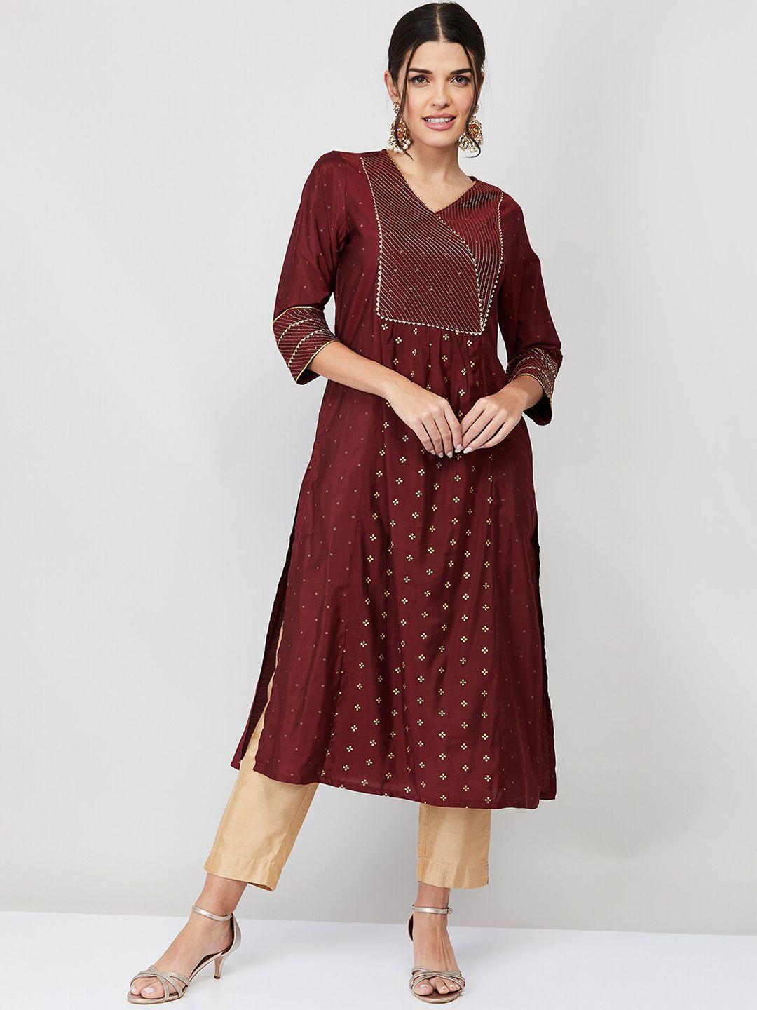 melange by lifestyle women maroon ethnic motifs embroidered flared sleeves kurta