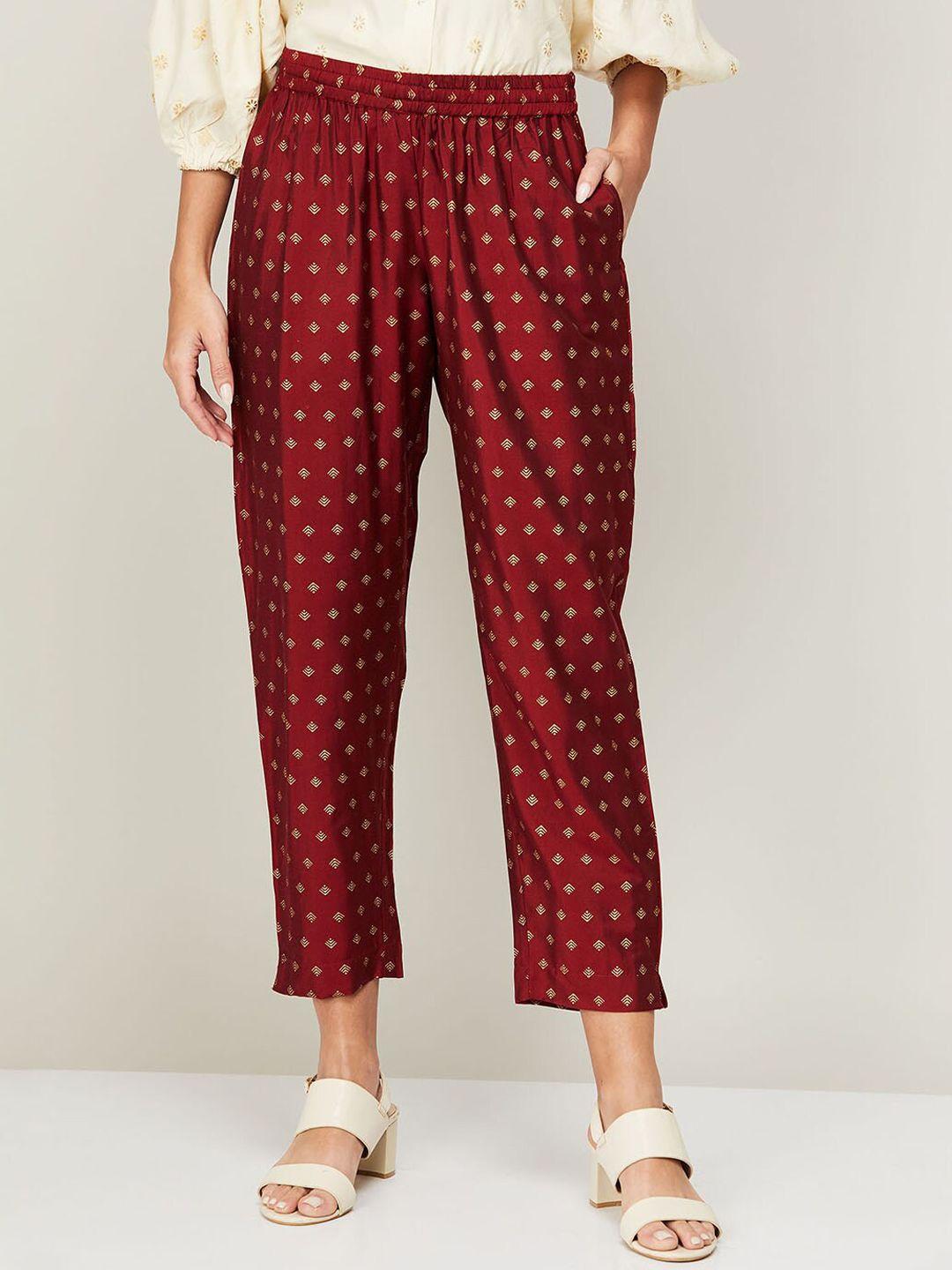 melange by lifestyle women maroon ethnic motifs printed trousers