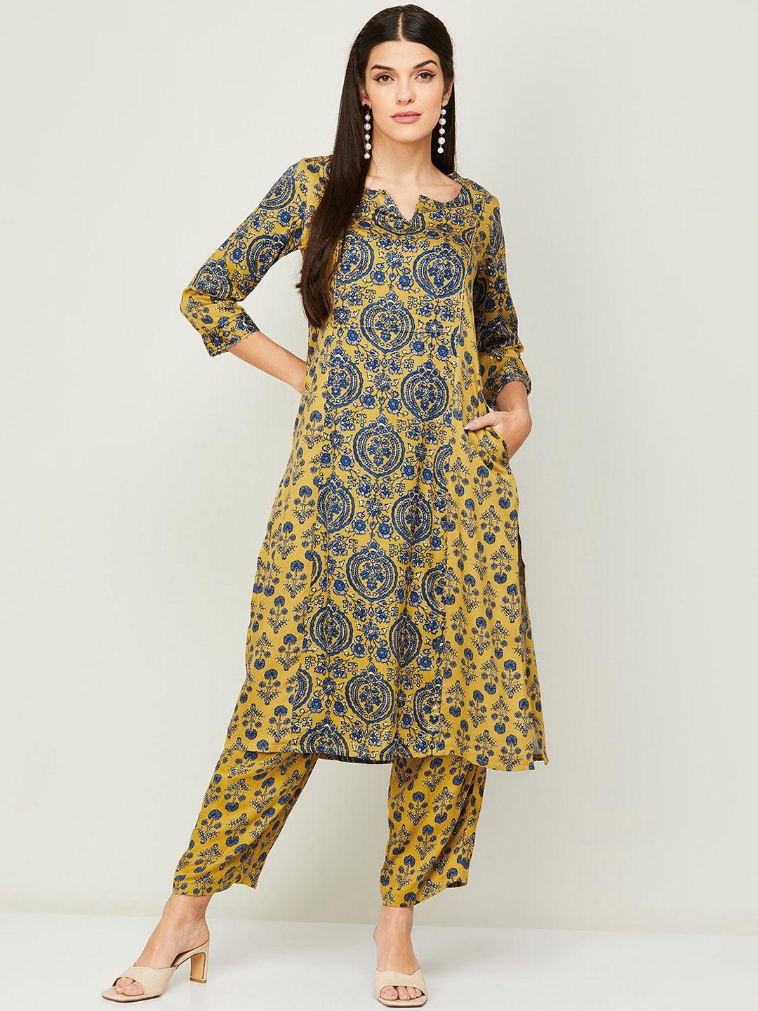 melange by lifestyle women mustard yellow ethnic motifs printed kurta with trousers