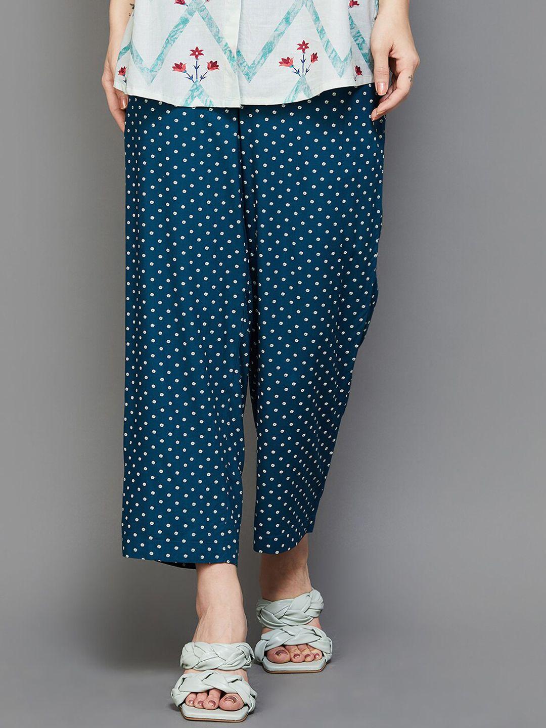 melange by lifestyle women teal polka dot printed pleated trousers