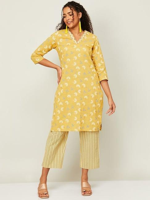 melange by lifestyle yellow cotton floral print kurta pant set