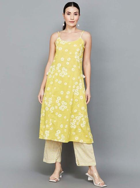 melange by lifestyle yellow cotton floral print kurta pant set