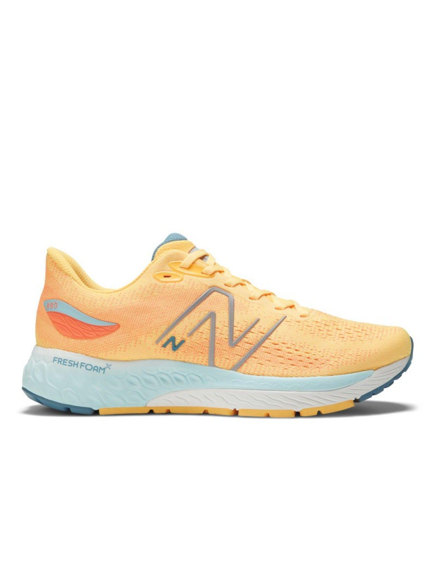 men 880 orange running shoe