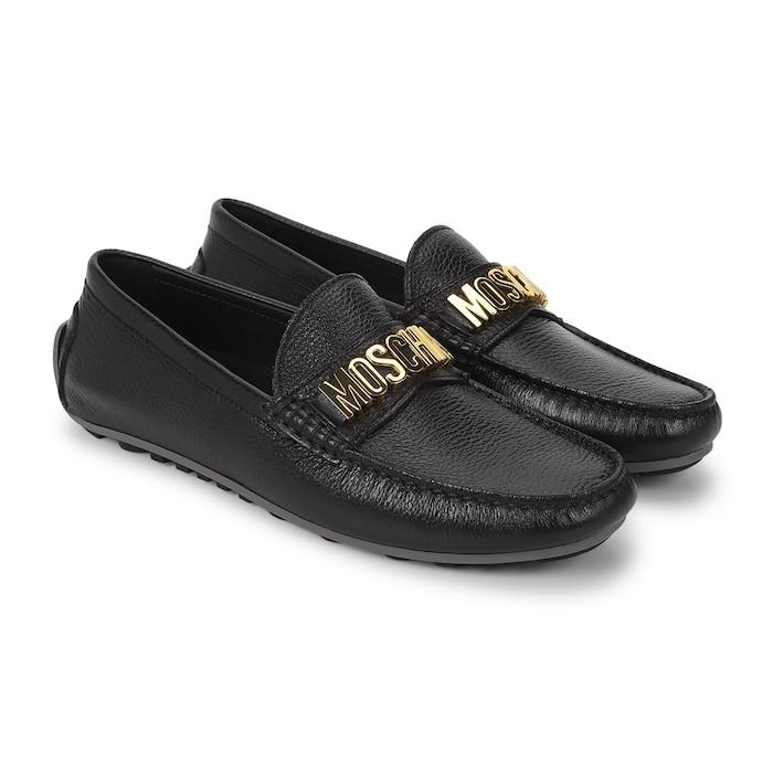 men black top gold branding driving shoes